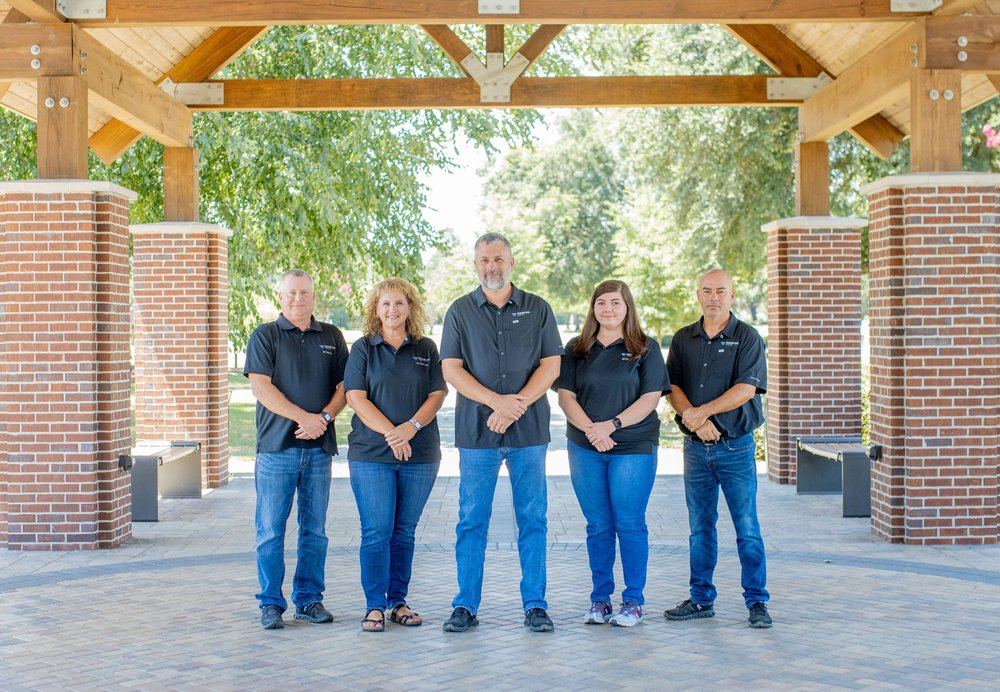 The Weather Tech Roofing team